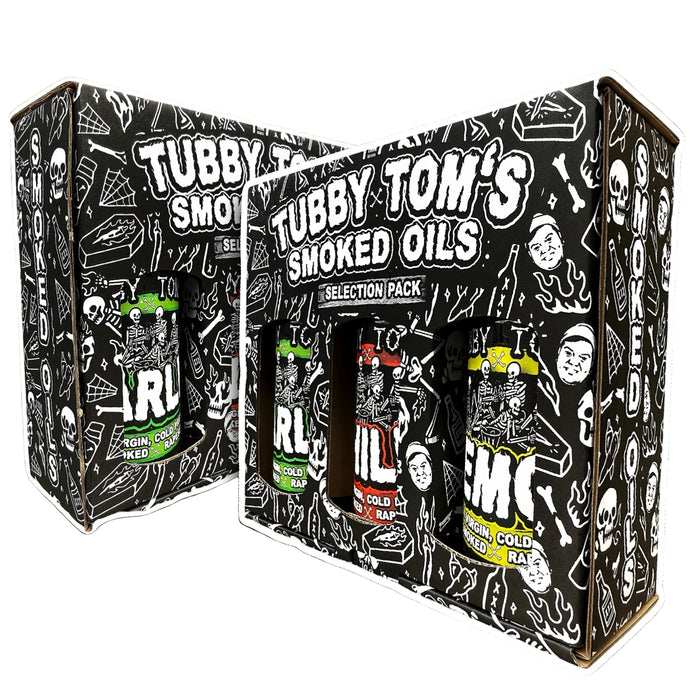 Tubby Tom's Smoked Oils packaging on a camouflage background