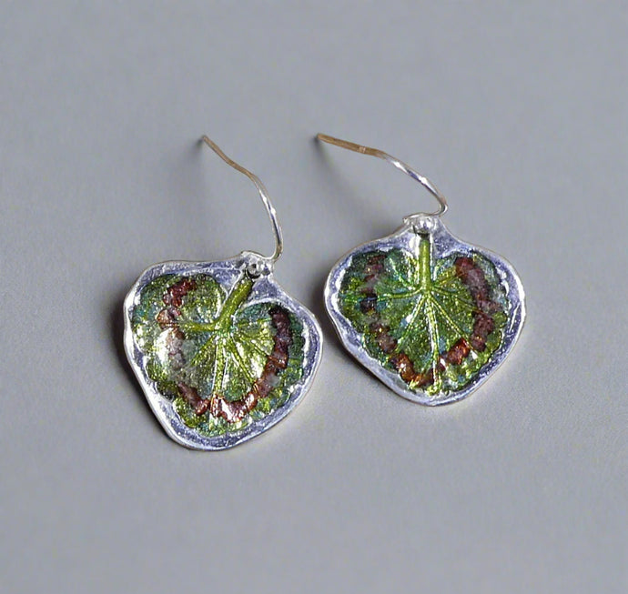 Jane Vernon Fine silver earrings with geranium leaf impression and colour