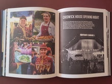 Load image into Gallery viewer, Open book showing a photo of people at an event with text about Chiswick House opening night.