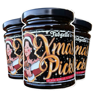 Three jars of Tubgella's Christmas Pickles with festive design on a Christmas tree background.
