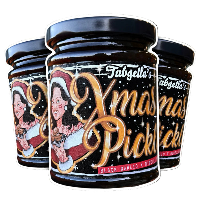 Three jars of Tubgella's Christmas Pickles with festive design on a Christmas tree background.