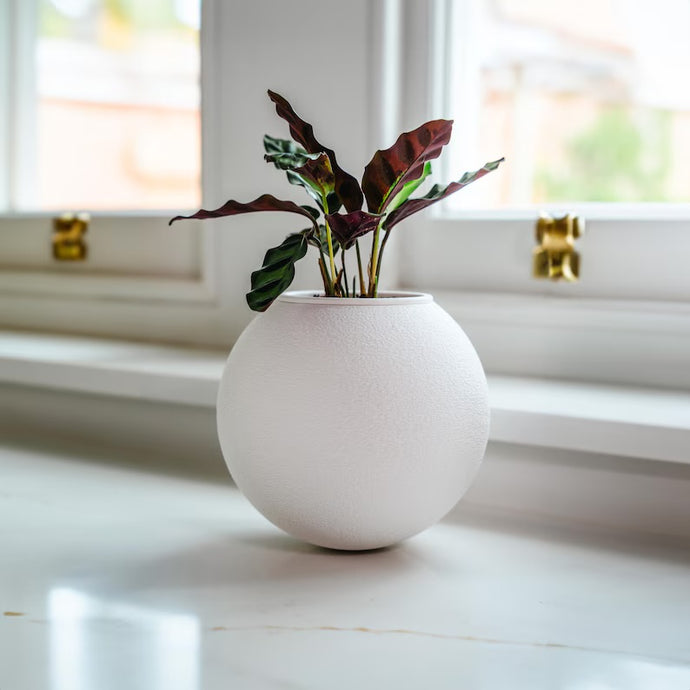 ’The Wobble Pot’ - A self balancing plant pot from Sliced Earth