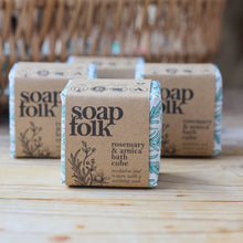 Load image into Gallery viewer, Three soap folk bath cubes on a wooden surface with a blurred background