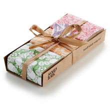 Load image into Gallery viewer, Box of soap bars with floral designs and &#39;soap folk&#39; branding on a white background