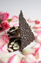 Load image into Gallery viewer, Flowers and Thorn Persian rose essence with almonds in dark Ecuadorian chocolate bark 